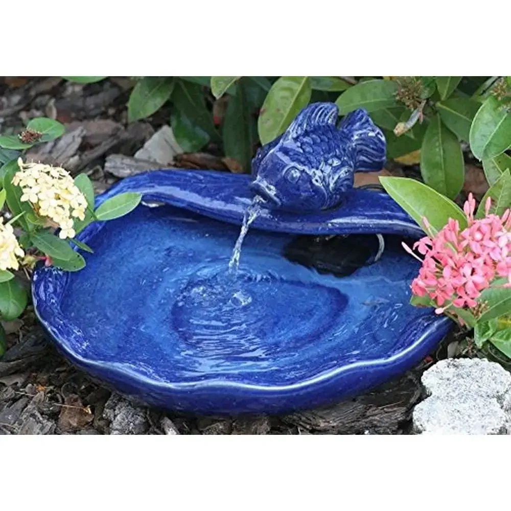 

Ceramic Solar Koi Fountain Blue Glazed Finish Recycles Water Operates in Sunlight Low Voltage Pump Filter Solar Panel 10ft Cable