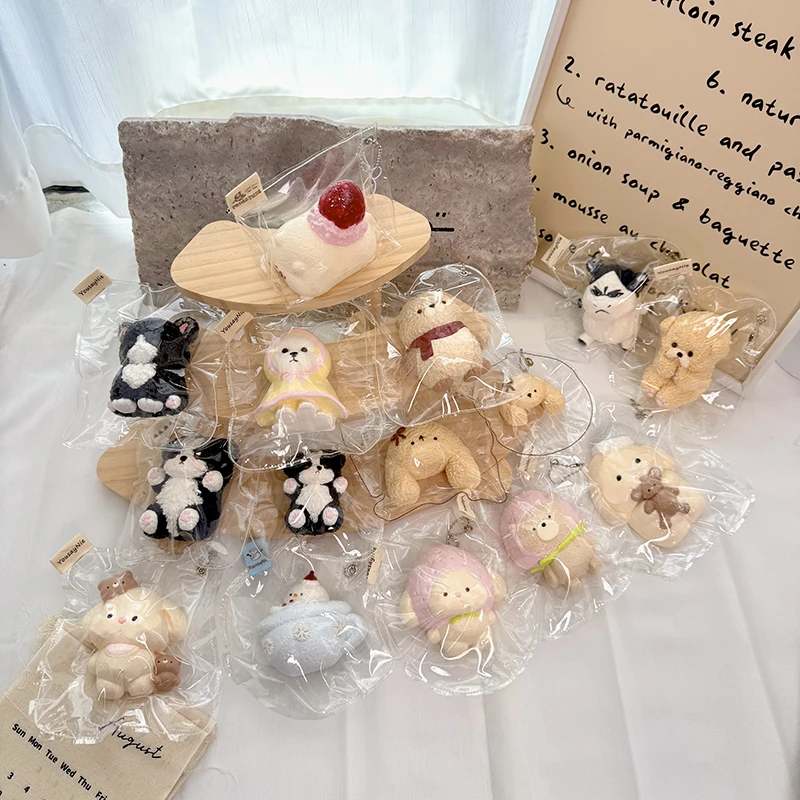 YousayNie Handmade realistic animal-themed squishies—featuring a puppy, rabbit, sea otter, cow, bear, and a snowman in a teacup.