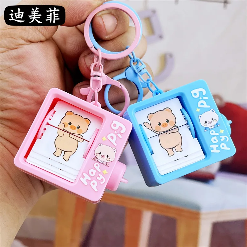 Funny Book Flip Animation Machine Keychain Pendant Creative and Refined Backpack Gift