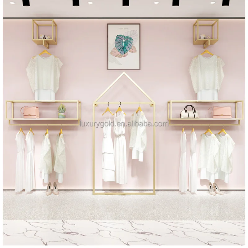 Personalizzato. Lady Boutique store furniture standing rackmetal espositore per abbigliamento dorato su wallvv