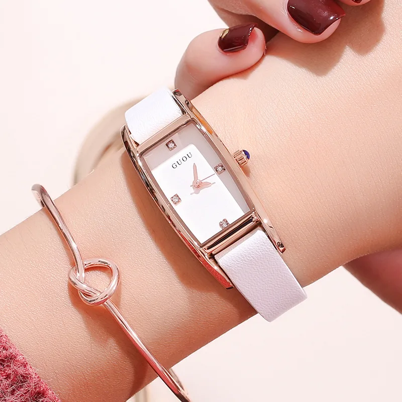 ساعة يد نسائية أنيقة، ساعة نسائية مستطيلة بسيطة على الطراز الأوروبي والأمريكي مع حزام رفيع عصري.