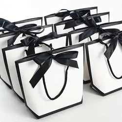 Sacchetti regalo in carta bianca con fiocco in nastro da 5 pezzi con manici borse per la vendita al dettaglio di compleanno per feste di matrimonio per feste di Shopping