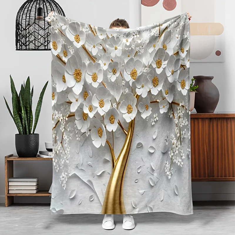

A charming white three-dimensional floral-patterned flannel blanket, usable on both sides