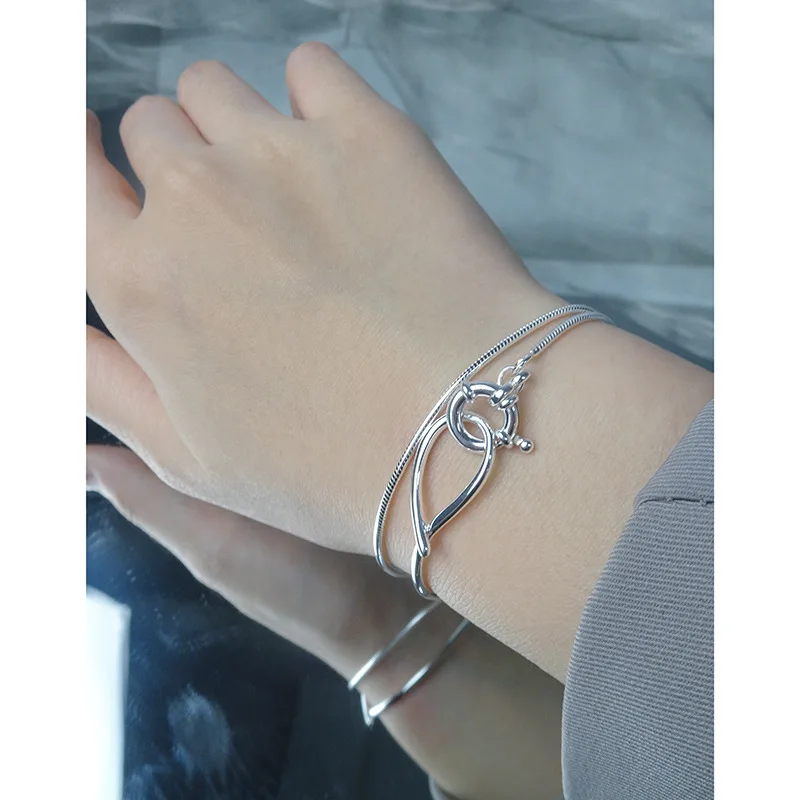 S25 فضة دعم كشف المتخصصة تصميم الشعور الحد الأدنى الفاخرة مزاجه مهرج ثعبان العظام سوار مزدوج الإناث.