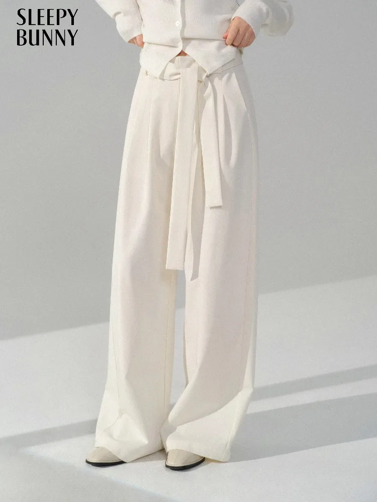 Elegante losse gedrapeerde stropdas taille wijde pijpen broek hoge taille rechte lange broek dames herfst winter minimalistische dagelijkse outfit look