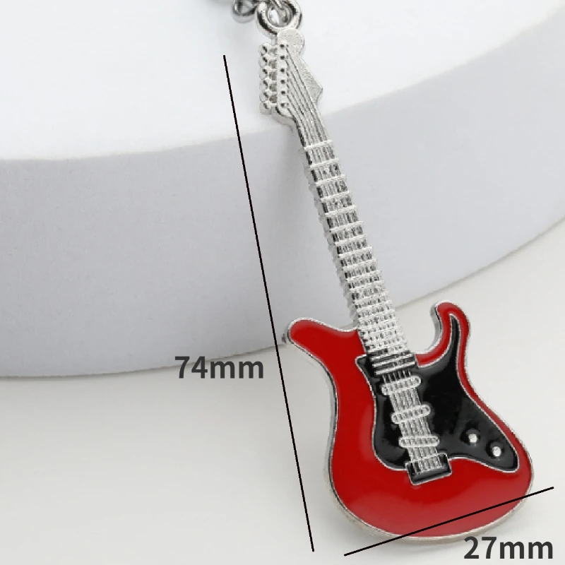 1pcs musical instrument pendant movable gift bag adorns guitar key ring