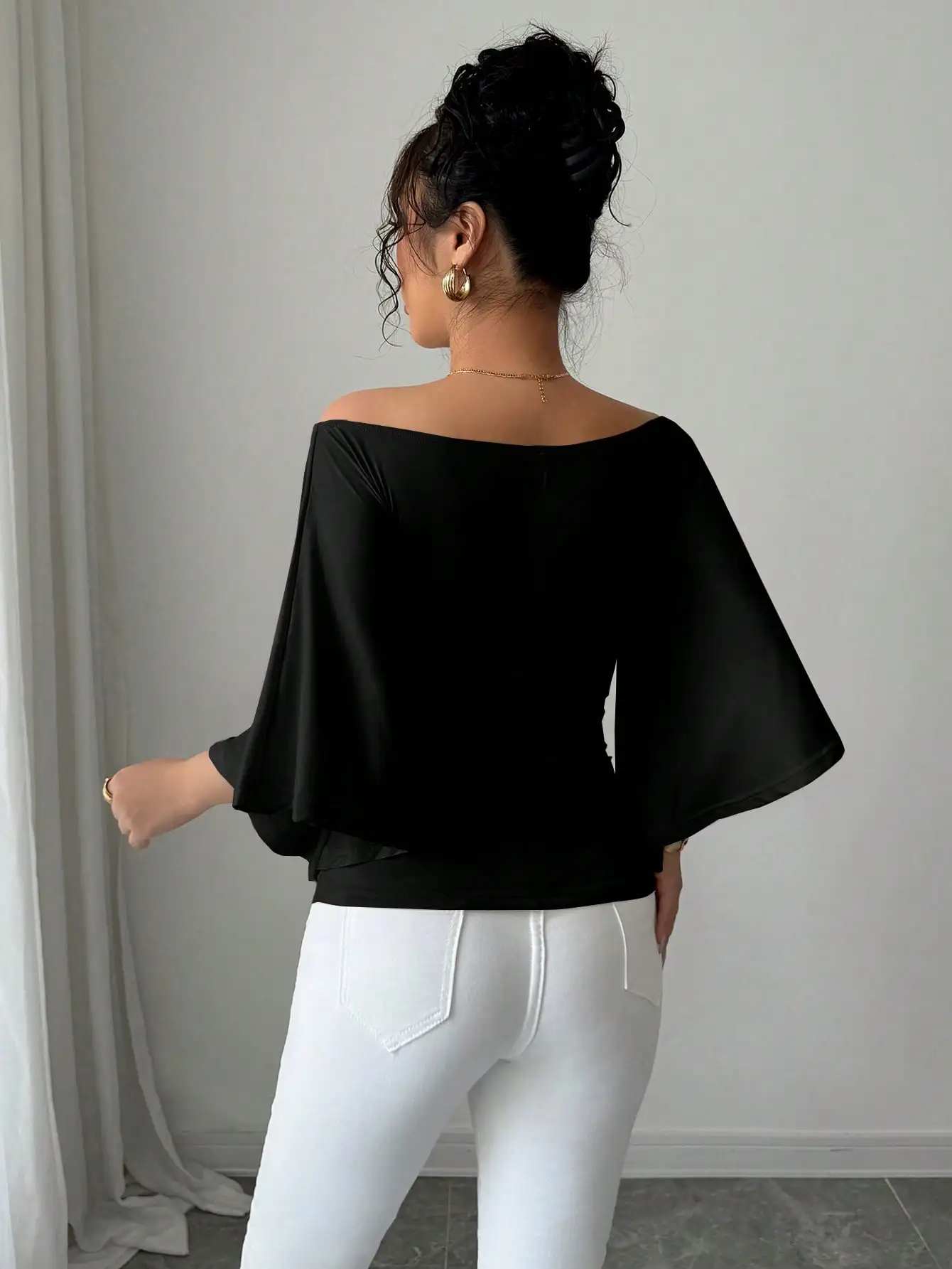 Nuevo top de manga de murciélago de un solo hombro de color liso para mujer, elegante vestido de mujer de media manga con un toque de diseño