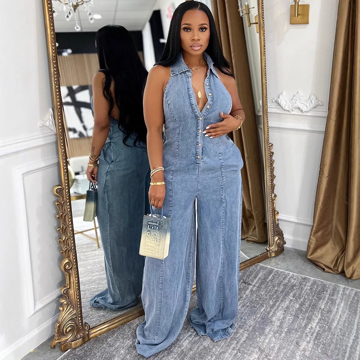 

2025 New Blue Denim Halter Neck Sleeveless Lapel Single Breasted Wide Leg Jumpsuit Women Fashion Temperament Casual Suit