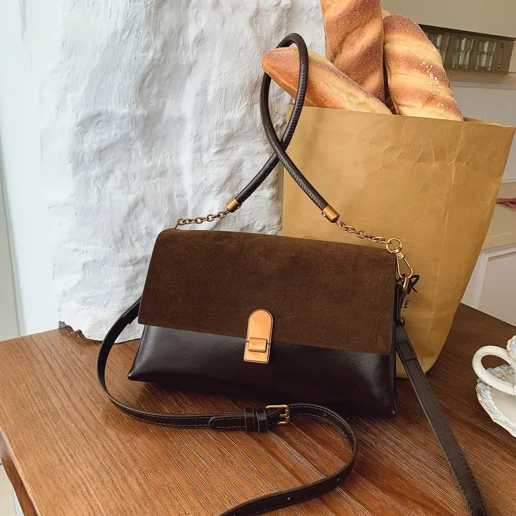 

Original Chic Satchel With Paris Influence And Textured Finish Easily Functions As A Spacious And Stylish Commuter Diaper Bag