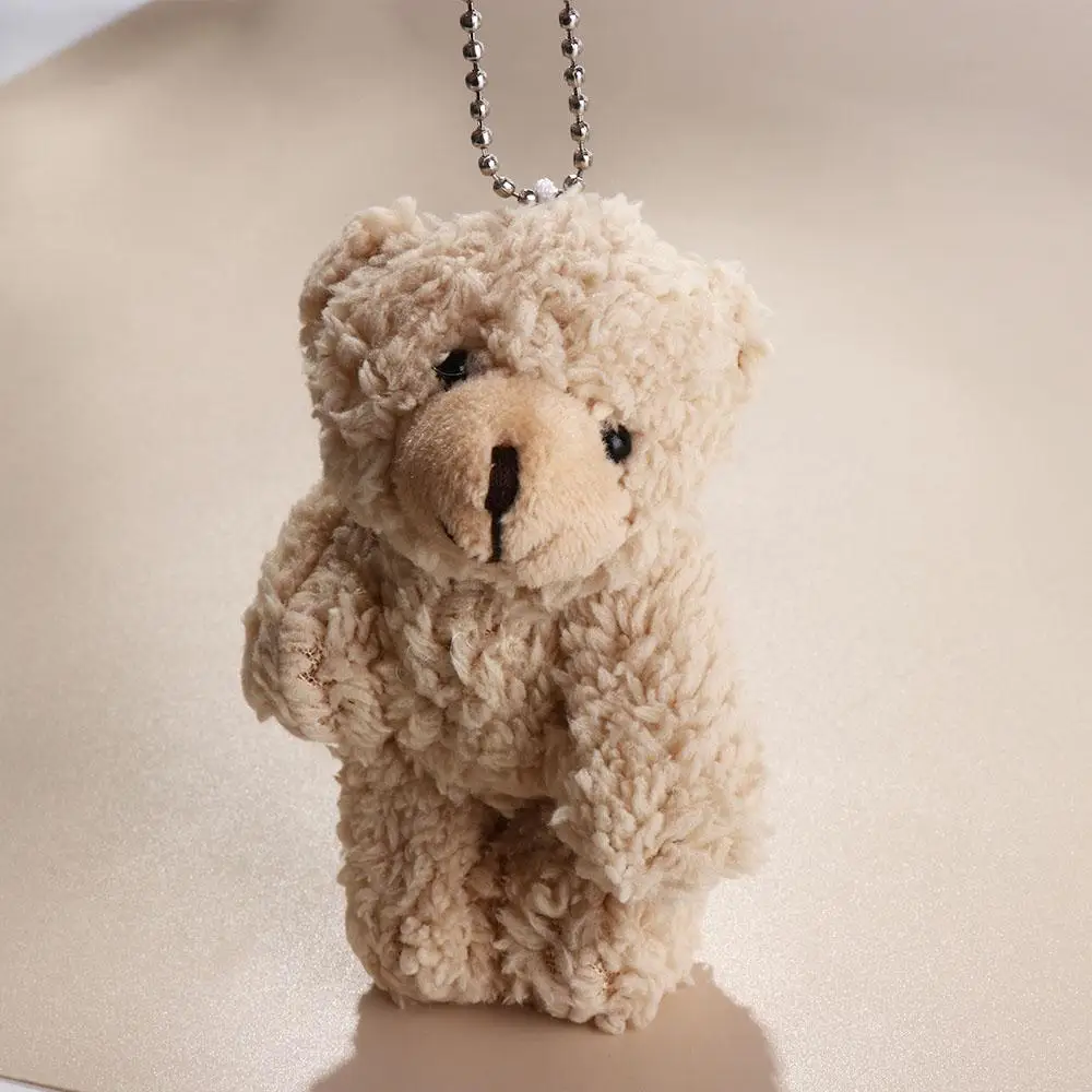 ผ้าพันคอหมีดอกไม้คริสต์มาสตุ๊กตาหมีตุ๊กตาผ้าฝ้าย PP คริสต์มาสตุ๊กตาหมีน่ารักนุ่มคริสต์มาสหมีตุ๊กตาจี้