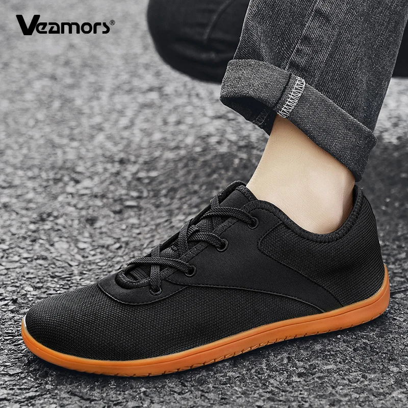 รองเท้าผ้าใบตาข่ายระบายอากาศ รองเท้าลำลองหัวกว้าง รองเท้ากีฬาครอสเทรนนิ่งสำหรับผู้หญิง รองเท้ากันลื่นสำหรับผู้ชาย รองเท้าเดินเล่นกลางแจ้งแบบแบน