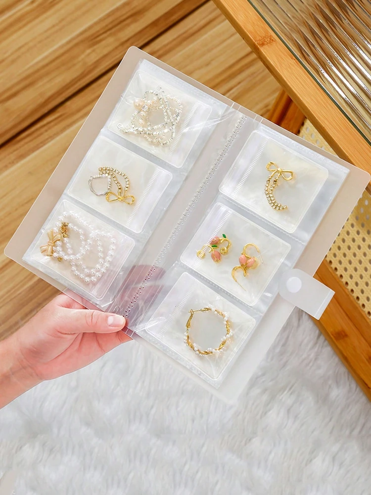 

Коробка для хранения ювелирных изделий, серьги, антиокислительное кольцо, украшение для рук, прозрачный мешок для хранения пыли, ожерелье, книга для ювелирных изделий, герметичная сумка