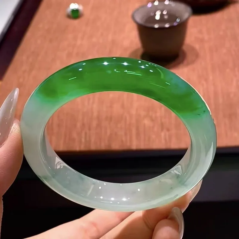 Jadeite bracelet with white background and green border, made from old mine glass jade, suitable for gifting