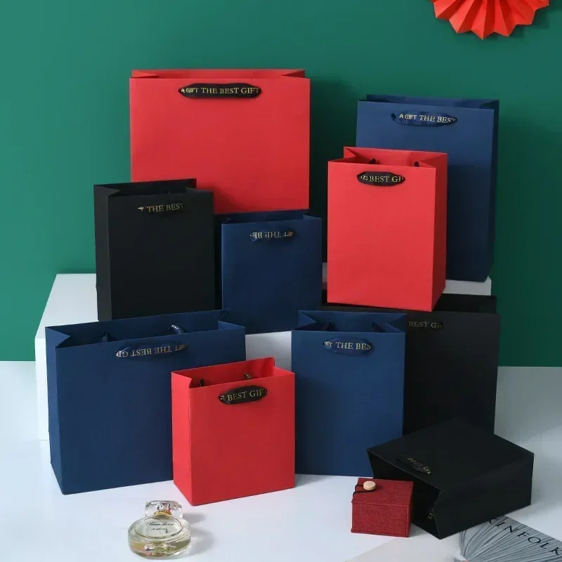 

Red Handbag Thick Wide Handle Durable Clothing Cosmetic Portable Bag Paper Jam Strong Bearing Gift Packaging Bag Shopping Bags