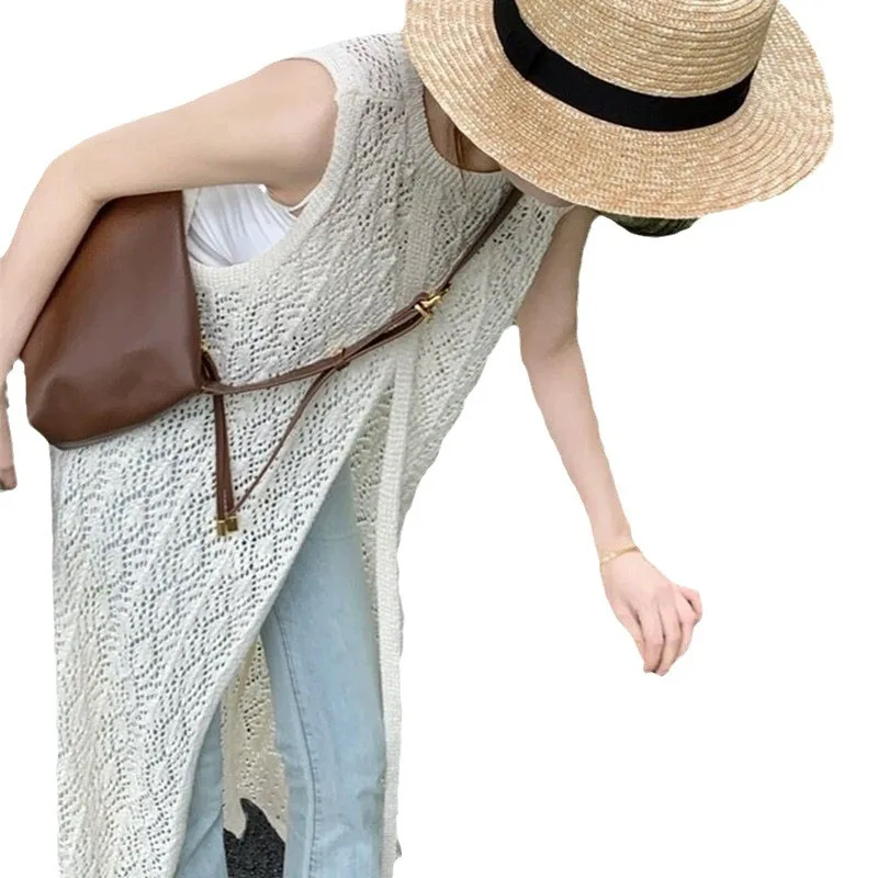 ชุดเดรสชายหาดกลวงออก สาวเผ็ดยุโรปและอเมริกา ทรงยาว คอกลม สไตล์แขนกุด เสื้อสเวตเตอร์ถัก กระโปรงเสื้อกั๊ก