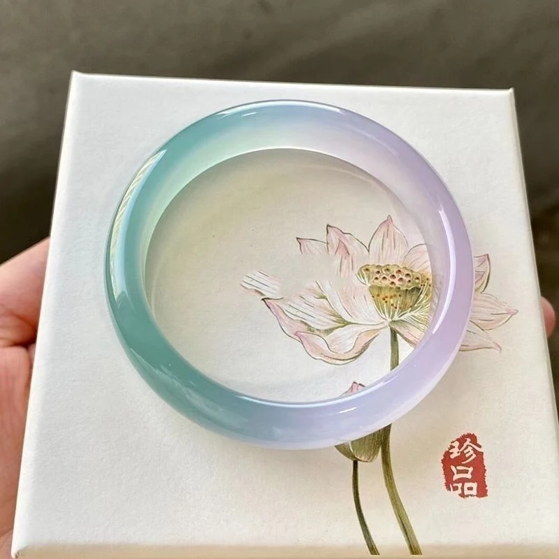 

Authentic dual-color Burmese jadeite bracelet in light violet with blue floral patterns, perfect as a gift for a girlfriend
