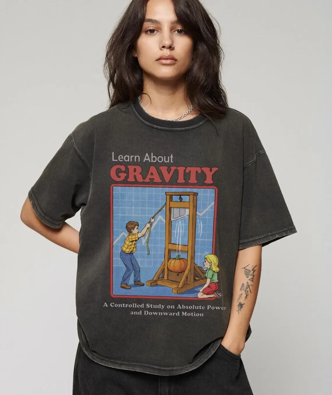 Learn about Gravity Shirt, Guillotine Science Experiment Tee, Vintage Classroom Graphic, Retro Dark Humor Shirt