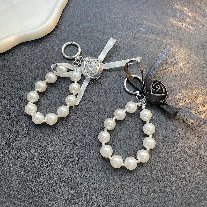 

Автомобильный брелок с розовым жемчугом, маленькая подвеска-сумка в ароматном стиле, подвесная цепочка для мобильного телефона, веревка с защитой от потерь, для iPhone 17 16