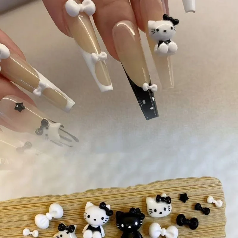 ชาร์มตกแต่งเล็บลายเฮลโลคิตตี้ 50 ชิ้น สีดำขาว คละแบบ น่ารัก 3 มิติ รูปหัวใจและโบว์  อุปกรณ์ตกแต่งเล็บสุดเก๋ น่ารัก สำหรับทำเล็บ