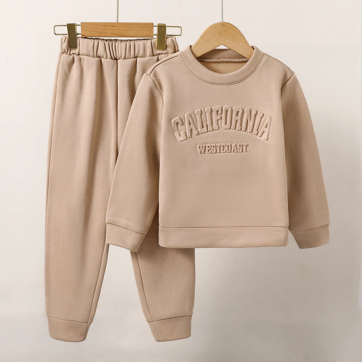 Two Piece Girl's Solid Color Set With Embossed Lettering  Round Neck Hoodie Pants Casual Sportswear