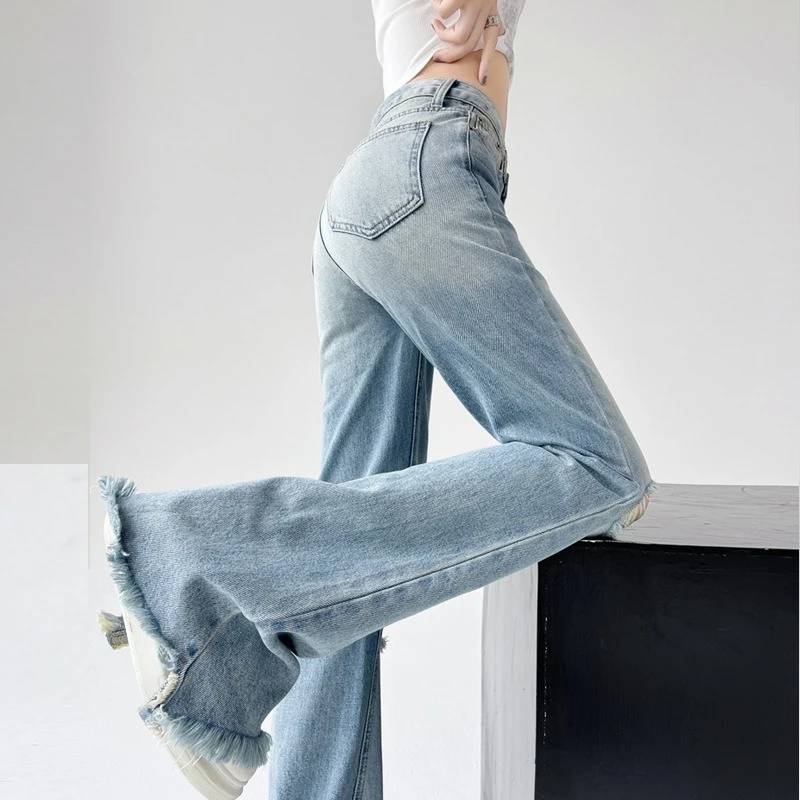 بنطلون جينز نسائي أزرق مغسول عالي الخصر بقصة ضيقة ومتوهج للتخسيس بحاشية متوترة وجرس قيعان طويلة من قماش الدنيم