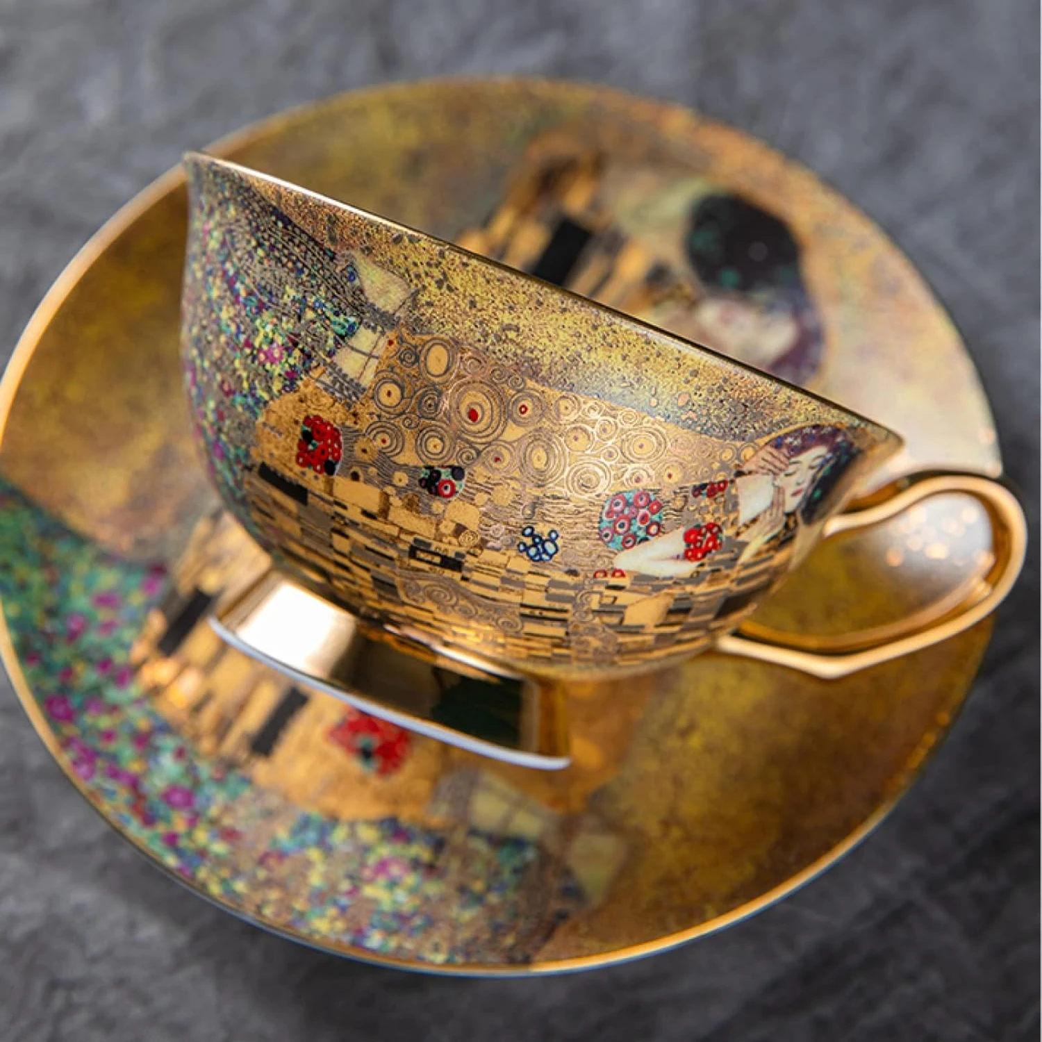 

Elegant, stylish, and beautifully crafted decorative Klimt Kiss pottery coffee mug and saucer set, perfect for enjoying coffee,