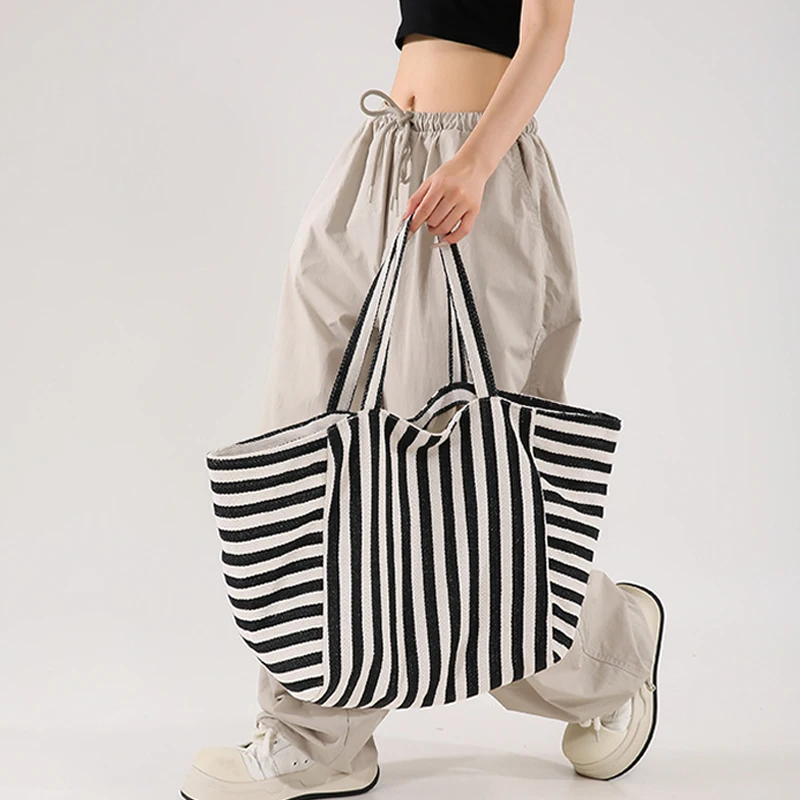 حقيبة كتف مخططة بسيطة وجديدة النسخة الكورية من حقيبة اليد الأدبية الرجعية حقيبة تسوق ذات سعة كبيرة #1