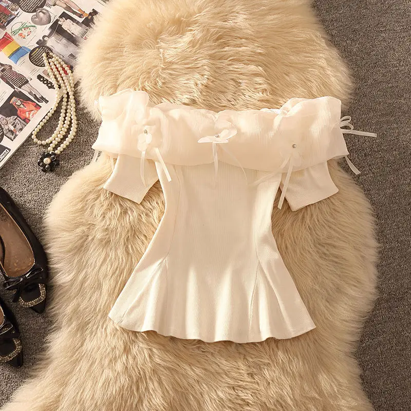 French three-dimensional flower short sleeved T-shirt for women, Xia Chunyi, one shoulder, waist cinched, pleated skirt top