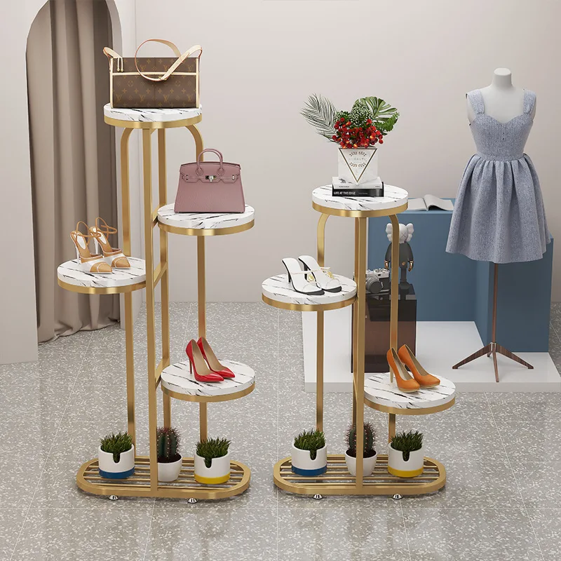 Shoe store floor-to-ceiling window display bag rack shoe rack golden iron clothing store display shelf flower