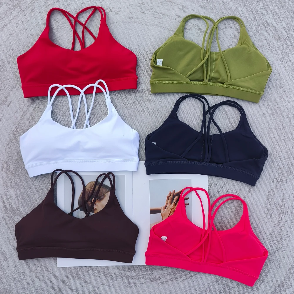 Sports bra with thin shoulder straps, crossed back, medium intensity yoga Pilates training, sports bra