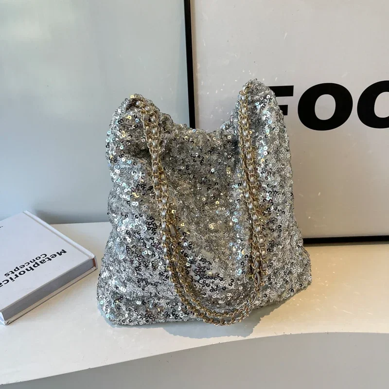 Bolsos de hombro brillantes y versátiles, bolsos femeninos con cerrojo de lentejuelas a la moda, a la venta, novedad de 2024, bolsos de hombro con sentido avanzado, paquete femenino