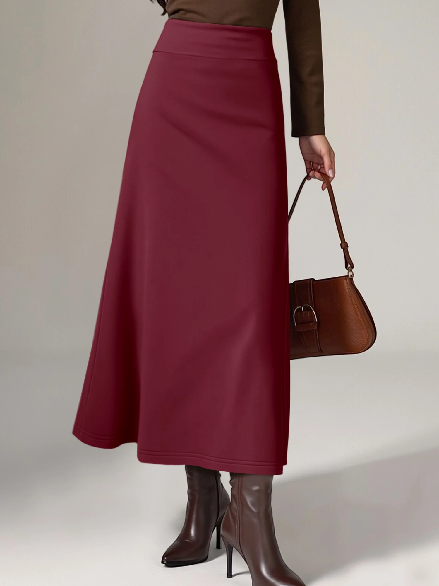 

Элегантная юбка миди с высокой талией, расклешенным подолом, эластичным поясом, удобная посадка, идеально подходит для юбилейных ужинов и коктейльных вечеринок.