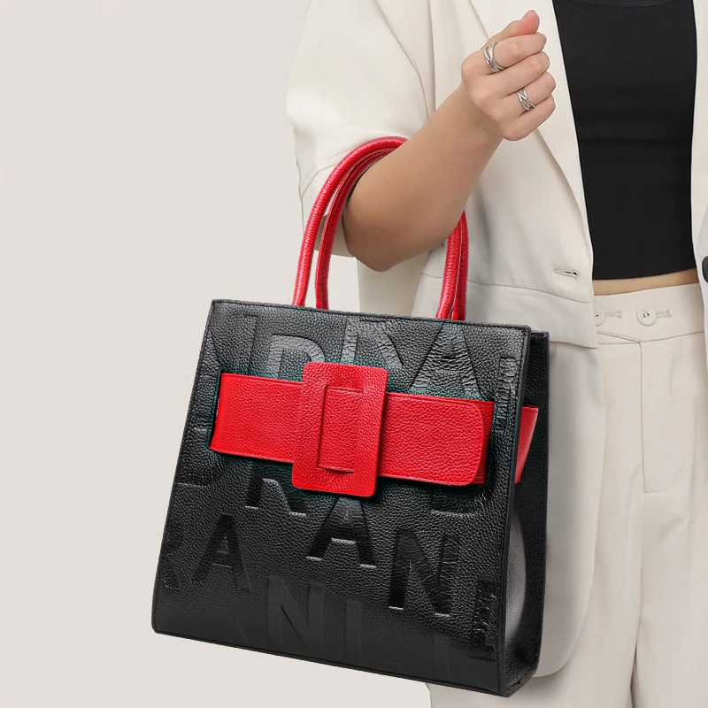 

Embossed - Letter Leather Tote: Color - Block Strap & Dual Handles