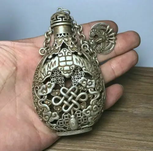 

Tibetan silver old copper incense sachet hollow-out carved Kirin Pendant for longevity snuff bottle