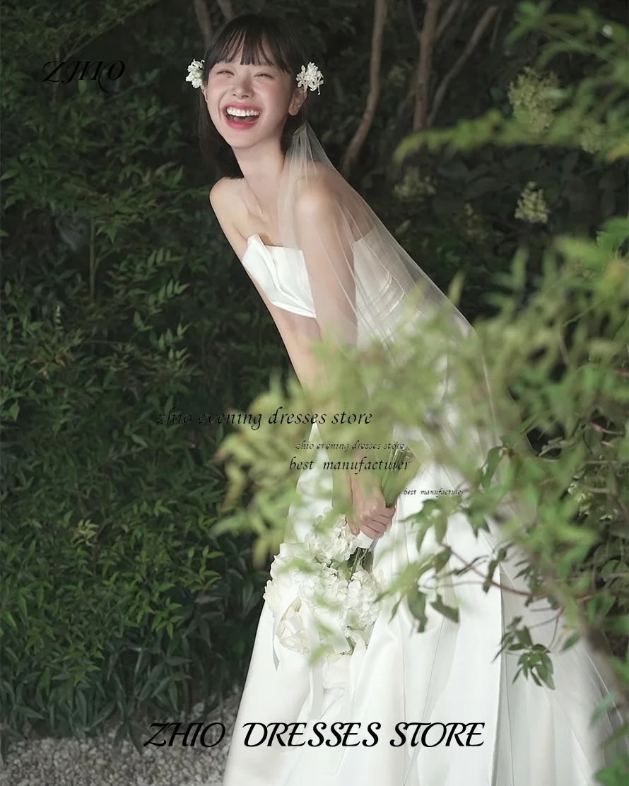ZHIO أنيق أبيض على شكل حرف a من الساتان الكوري لحفلات الزفاف بدون حمالات مطوي بدون أكمام مخصص مشد فساتين زفاف رومانسية