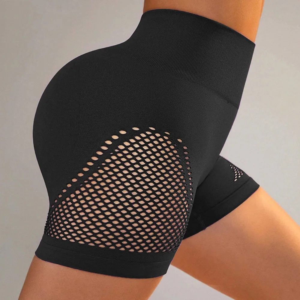 Seamless hollow yoga shorts summer high waist peach hip fitness pants female Europe and the United States elastic sports