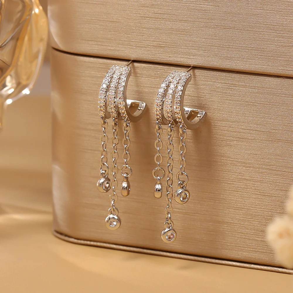 

Designed three rows of zircon tassel earrings, cool style earrings, high-end, exquisite and versatile earrings for women