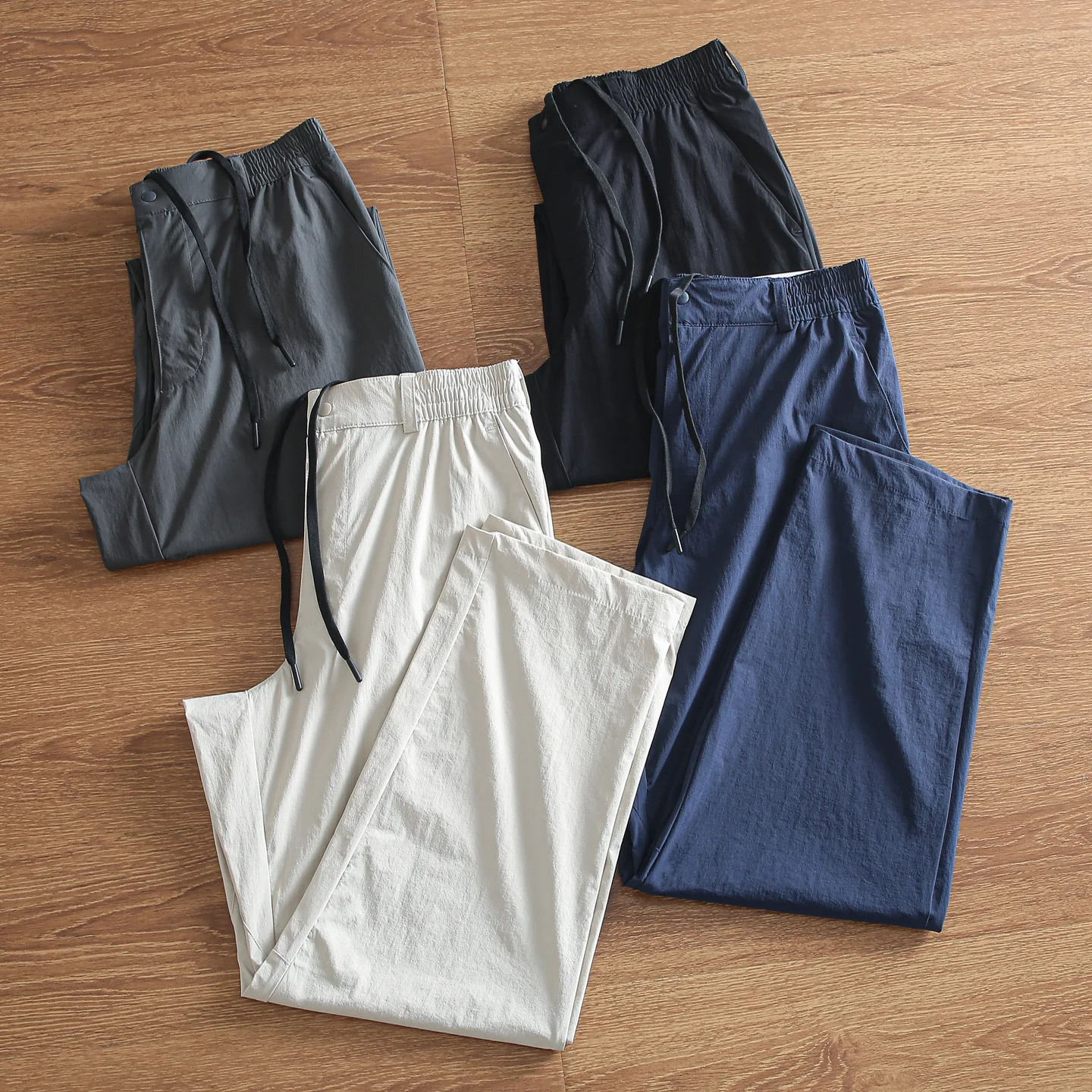 

2026 New Men's Casual Trousers Water-Resistant Skin-Friendly Elastic Absorbent Qui-Drng Spring Summer Long Pants