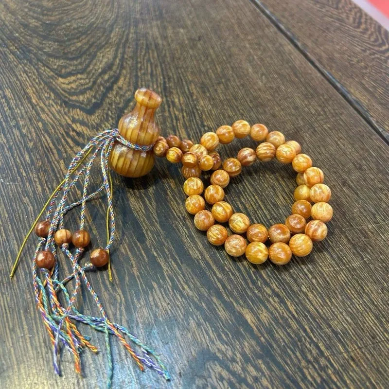 Natural fully translucent amber 10mmx36 bracelet, Northeast pine beads, high oil content raw wood
