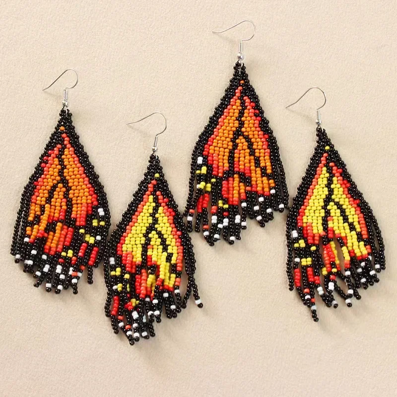 

Tassel Earrings Hand knitting Beaded Color matching rainbow Butterfly wings Love Bohemia alloy ma'am Rice Bead Earring