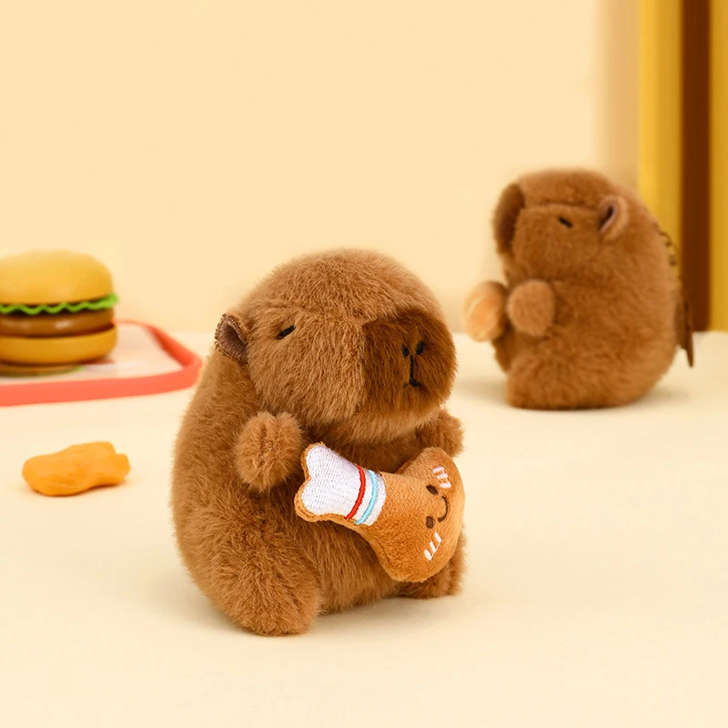 لطيف الكرتون كابيبارا قلادة المفاتيح لعبة دمية حقيبة حلي معلقة قلادة على ظهره أفخم دمية الحيوان كيرينغ