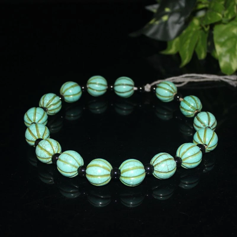 

Antique-style old , enhanced turquoise round , oval , bead string accessories, ancient beads