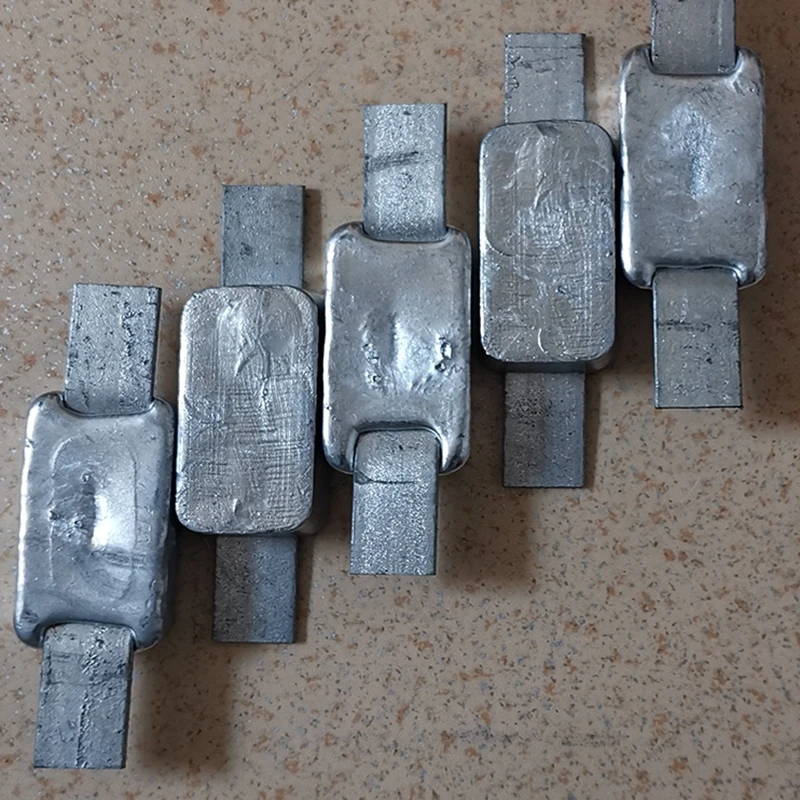 0.5kg 1kg spawany morski blok cynkowy anoda antykorozyjna ze stopu cynku fabryka bezpośrednie dostawy punktowych nóżek żelaznych dostosowana