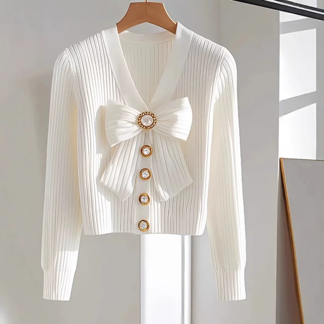 

White V-neck bow long-sleeved sweater female 2024 early autumn new Korean atmosphere fashion temperament top sweater