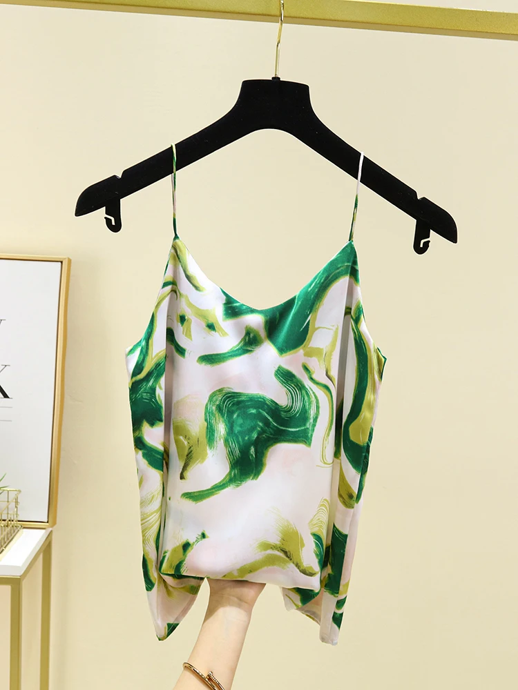 

New green and white printed V-neck slimming suit with underlying satin top