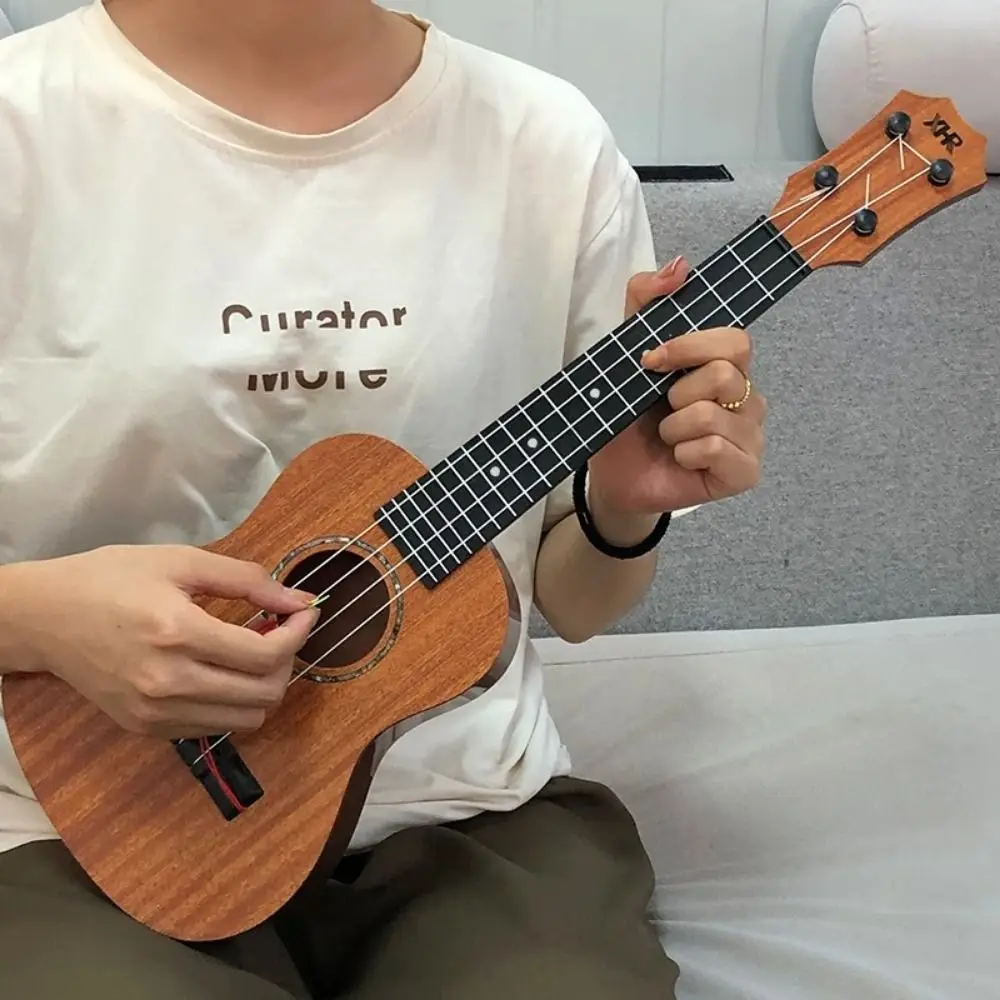 Ukulele 4-strunowe Instrument Muzyczny Regulowany Gałka Strunowa Yukrili Zabawki Symulacja Ukulele Wytrzymała Klasyczna Mała Gitara