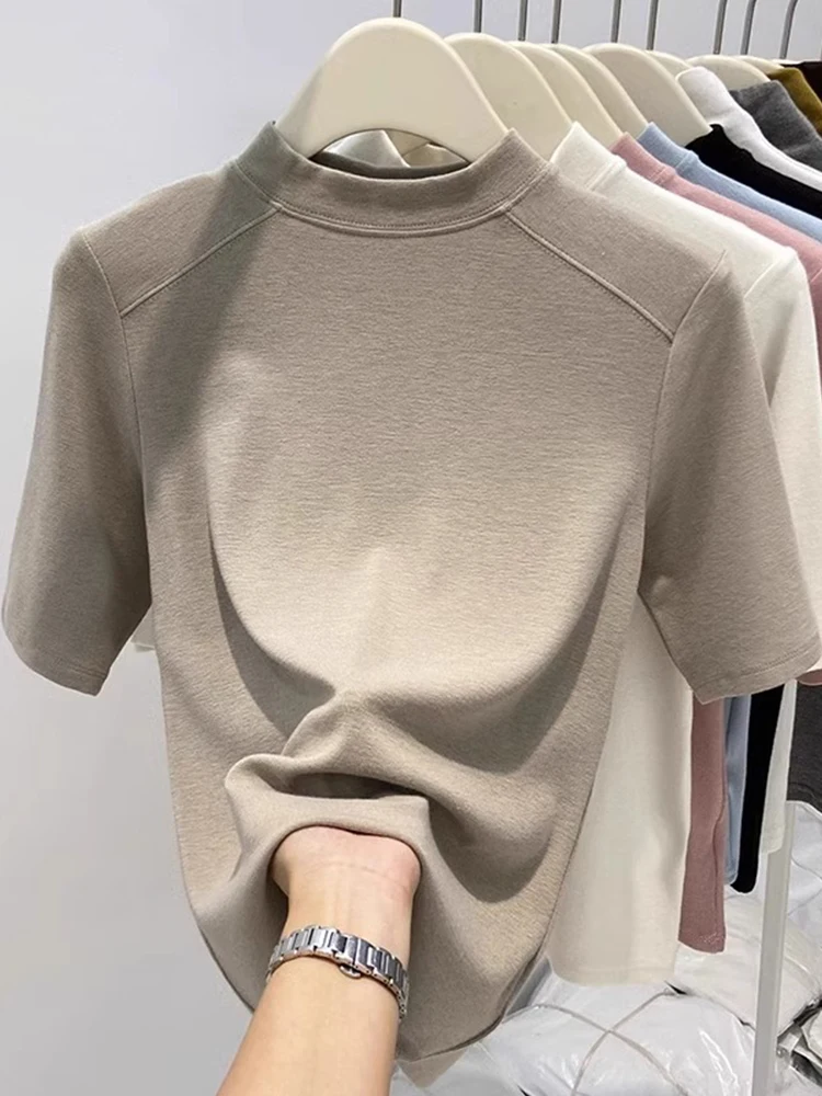 Efecto adelgazante Europeo Sle Velvet Base irt Mujer Faionable Corte ajustado Top de cuello alto Sve de cinco cuartos