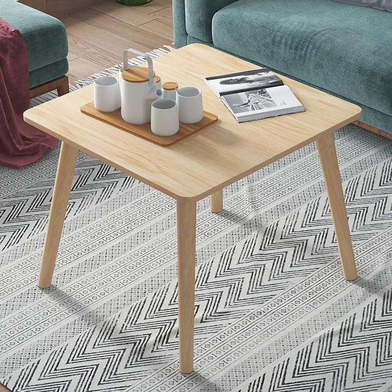 

Sleek Coffee Table with Wooden Legs Minimalist Living Room Centerpiece Low Profile Sofa Table Modern Furniture Design Elegant
