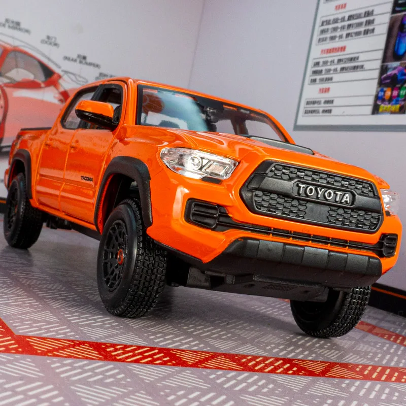 

Maisto 1:27 Toyota Tacoma Tacoma 2023 alloy off-road vehicle model pickup truck toy door can open children's birthday gifts