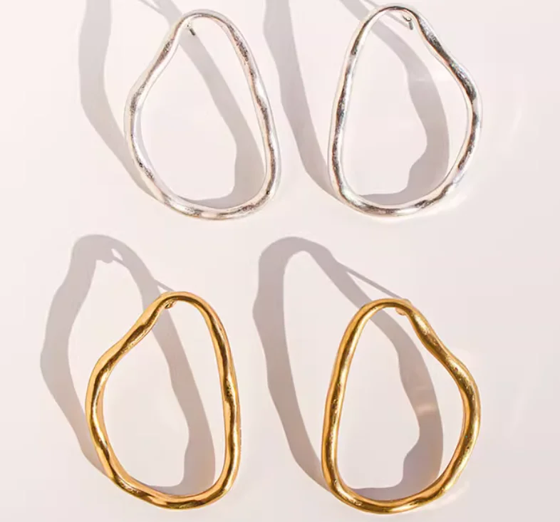 

Foreign trade jewelry niche retro gold irregular geometric line earrings cold wind silver exaggerated earrings.